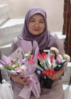 Dra. IKE RAHAYUNINGSIH